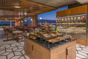 Daily buffet breakfast (USD 30 per person)