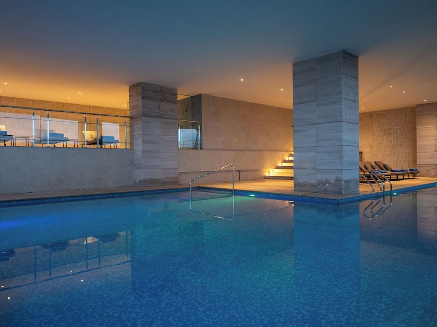 Outdoor pool, open 6:00 AM to 10:00 PM, sun loungers