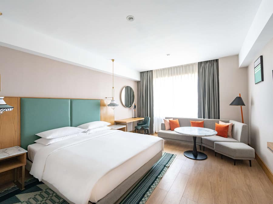 Premium bedding, down comforters, in-room safe, desk