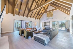 TV, fireplace, offices - HÓZHÓ Sunnyside | Lazy River | Indoor Pickleball (Scottsdale)