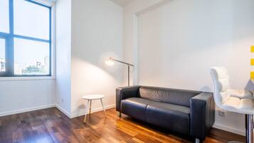 Standard Studio | Living area | 1-inch flat-screen TV with cable channels