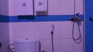 Standard Double Room | Bathroom | Bathtub, slippers, towels, soap