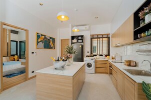 Two-Bedroom Deluxe Pool Villa - Central | Private kitchen | Fridge, microwave, oven, stovetop