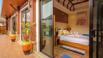 Three-Bedroom Pool Villa - West | In-room safe, blackout curtains, iron/ironing board, free WiFi