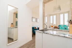 Comfort Apartment | Private kitchen | Microwave, coffee/tea maker, electric kettle, toaster