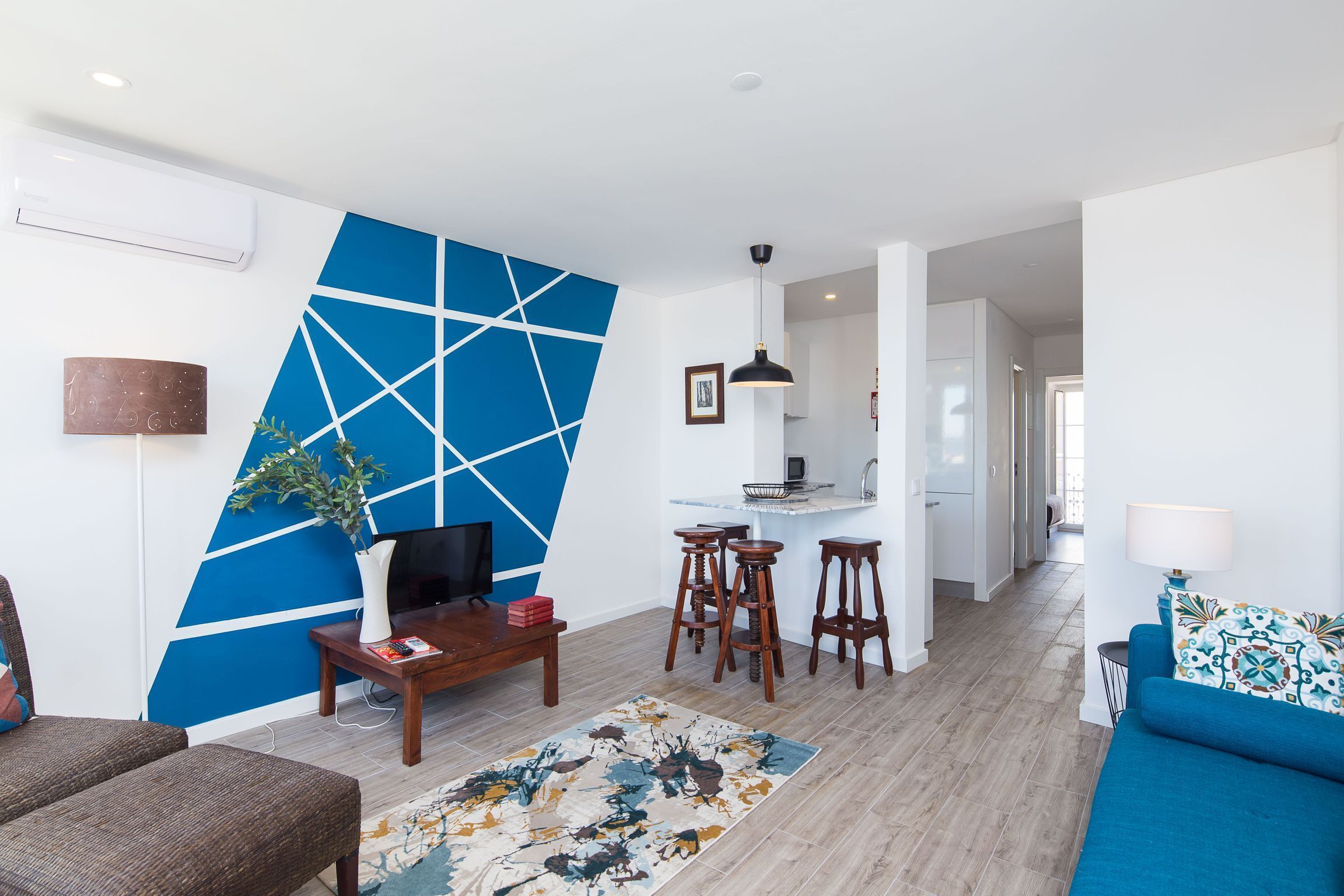 Comfort Apartment | Living area | Flat-screen TV