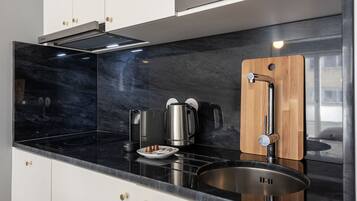 Deluxe Studio | Private kitchenette | Mini-fridge, microwave, stovetop, dishwasher