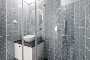 Classic Studio | Bathroom | Shower, hair dryer, towels, soap