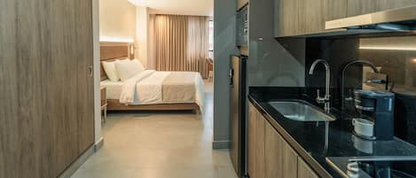 Premium Room, Kitchenette | Private kitchen | Fridge, microwave, stovetop, cookware/dishes/utensils