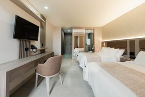 Junior Room, Kitchenette | Minibar, in-room safe, desk, laptop workspace - Amari Living Suites (Barranquilla)