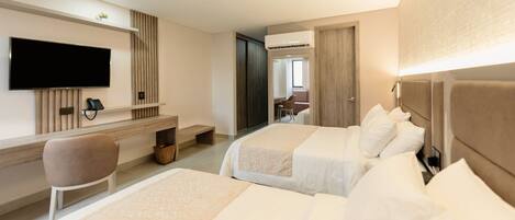 Habitación junior, cocina básica | 1 dormitorio, minibar, caja fuerte y escritorio