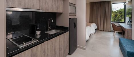 Superior Suite, Kitchenette | Minibar, in-room safe, desk, laptop workspace