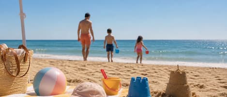 On the beach, beach towels