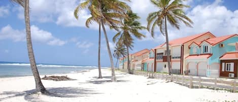 On the beach, sun-loungers, beach towels