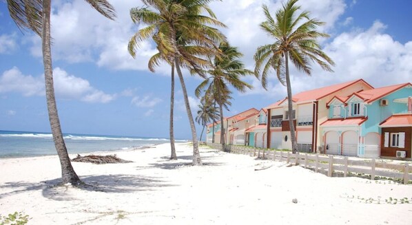 On the beach, sun-loungers, beach towels
