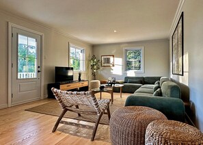 Smart TV, fireplace, table football, books