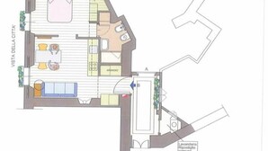 A floor plan of a Gold B apartment with a kitchenette, a living area, a bathroom, and a view labeled "VISTA DELLA CITTÀ". - Goldoni77. (Milano)