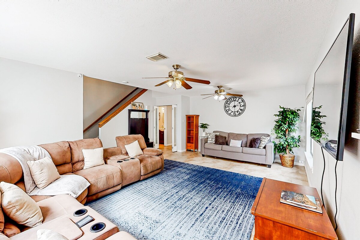 Dog-friendly home with huge yard, covered patio, & fireplace