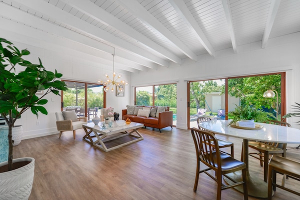 Deluxe Apartment | Living area | 50-inch Smart TV with cable channels