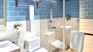Classic Single Room, No Windows | Bathroom | Hair dryer, slippers, towels, shampoo