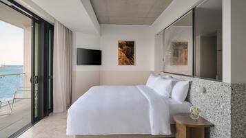 Suite de lujo, 1 cama King size, vista al océano | 1 habitación, ropa de cama de alta calidad y minibar