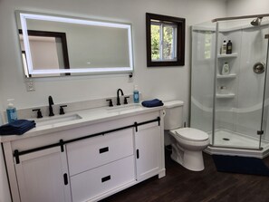Jetted bath, hair dryer, towels, soap