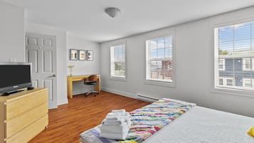 3 slaapkamers, een strijkplank/strijkijzer, reisbedje, gratis wifi