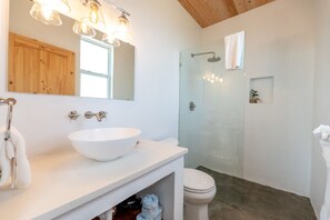 Shower, hair dryer, towels, soap - Modern Studio with Expansive Ocean View, Pool (Long Bay Hills)
