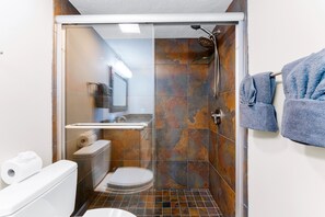 Shower, hair dryer, towels, soap