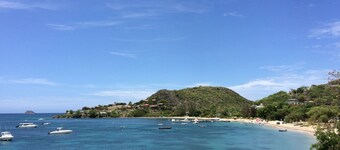 Private romantic retreat, ideally located, panoramic views, walk to the beach.  