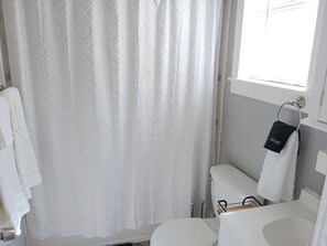 Hair dryer, towels, soap, shampoo