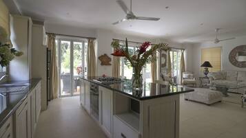 Luxury Villa | Private kitchen | Full-sized fridge, microwave, oven, stovetop