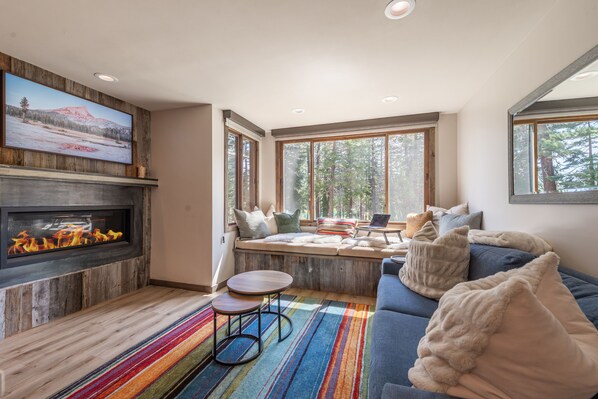 Executive Condo | Living area | 55-inch Smart TV with cable channels, Netflix, Hulu