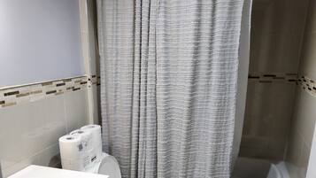 Hair dryer, towels, soap, shampoo