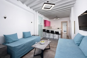 Comfort Apartment, Multiple Beds | Living area | 43-inch Smart TV with digital channels, Netflix, streaming services -  Hosting Moments Mykonos Town Apartment (Mykonos)