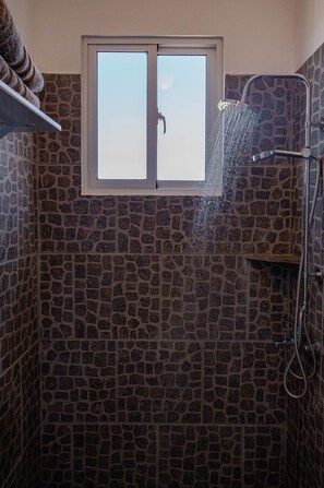 Shower, towels, soap, shampoo