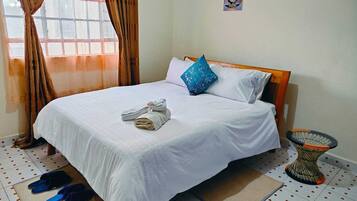 1 habitación, tabla de planchar con plancha, wifi gratis y ropa de cama