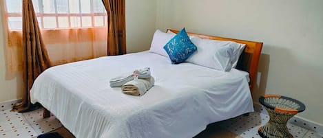 1 chambre, fer et planche Ă repasser, Wi-Fi gratuit, draps fournis