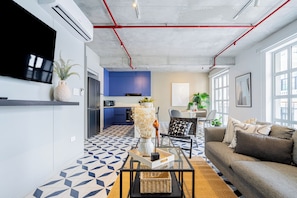Apartment, 2 Bedrooms (CC1A) | Living area | 100-inch Smart TV with satellite channels