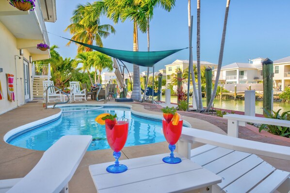 Outdoor pool, a heated pool - Sunchasers Paradise - lux home, private pool/spa, 80' dock (Marathon)
