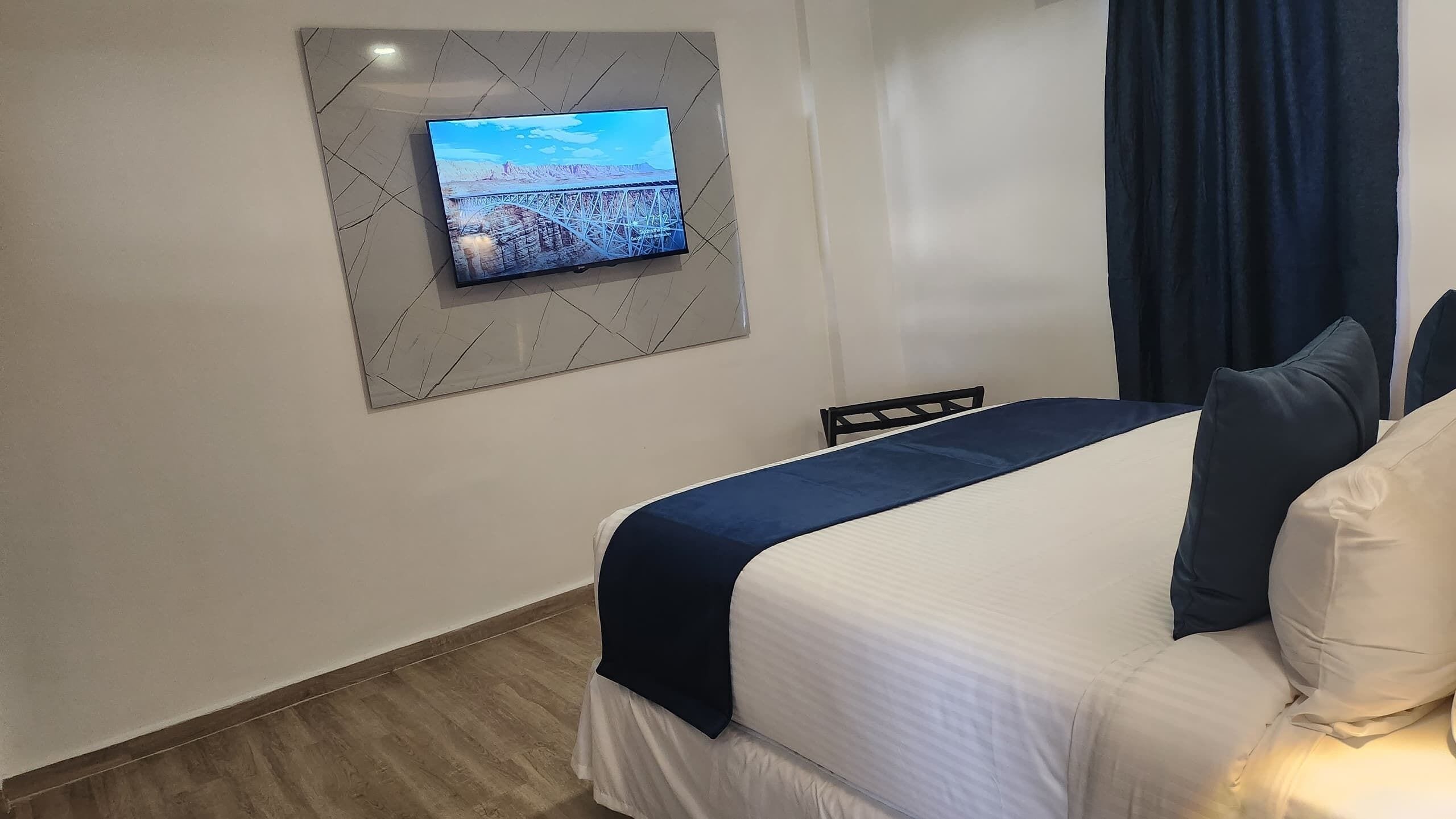 Deluxe Double Room, Balcony, Pool View | Free WiFi, bed sheets