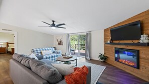 Smart TV, fireplace, books