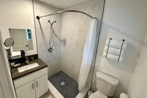 Hair dryer, towels, soap, toilet paper