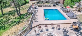 4BR Waterfront Cabin w/ Hot Tub, Pool + Swim & Boat dock