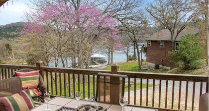 8BR Waterfront Cabin w/ Hot Tub, Pool + Swim & Boat dock