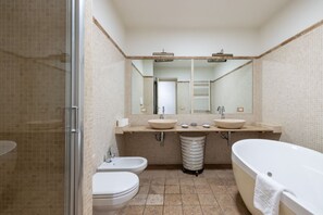 Shower, jetted tub, hair dryer, bidet