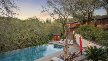 Saltwater, infinity-edge pool. Gas-heated to be comfortable all year.