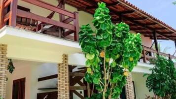 Quarto Quádruplo com Vista Lateral do Mar | View from room