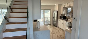 Luxurious Amenity Filled Water-Front Home in Family Friendly Neighborhood.