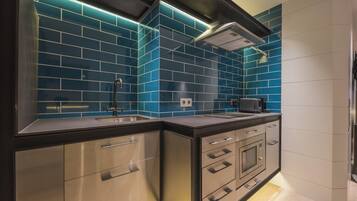 Fridge, microwave, coffee/tea maker, toaster
